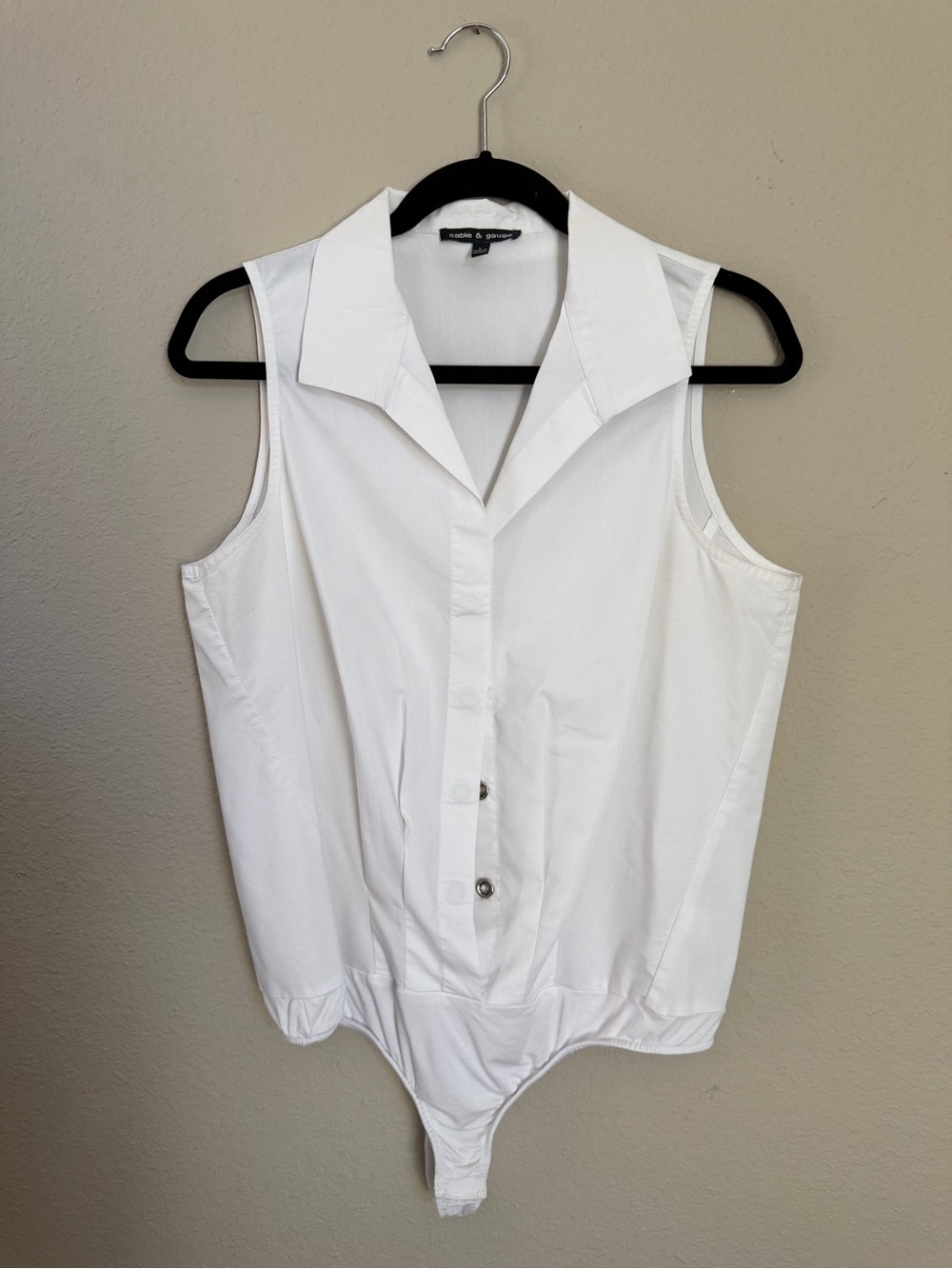 White Sleeveless Button Front Bodysuit